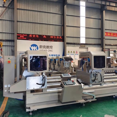 Machine à coudre à double tête automatique pour la fabrication de portes de fenêtres